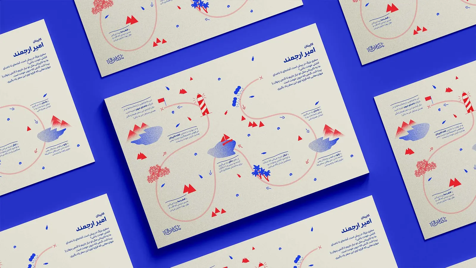 Cards with route illustrations on a blue table
