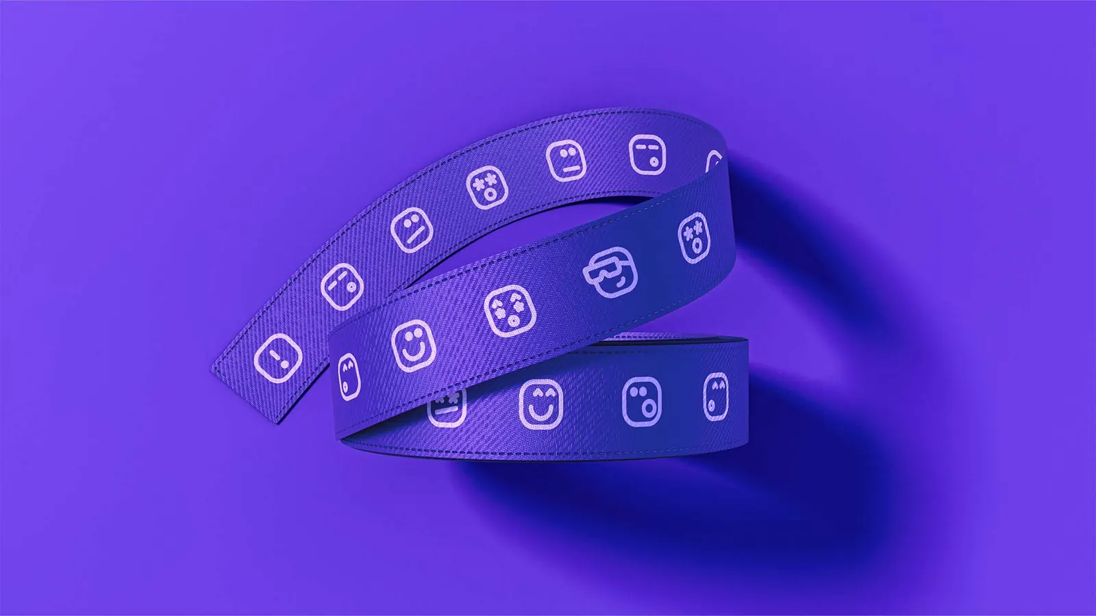 Purple Positron lanyards printed with the icon pattern