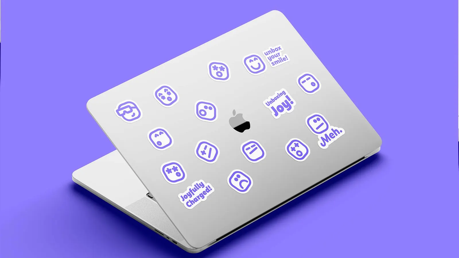 Laptop lid covered with Positron icon stickers